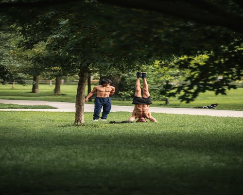 Man stretching arms outdoors embracing healthy physical activity